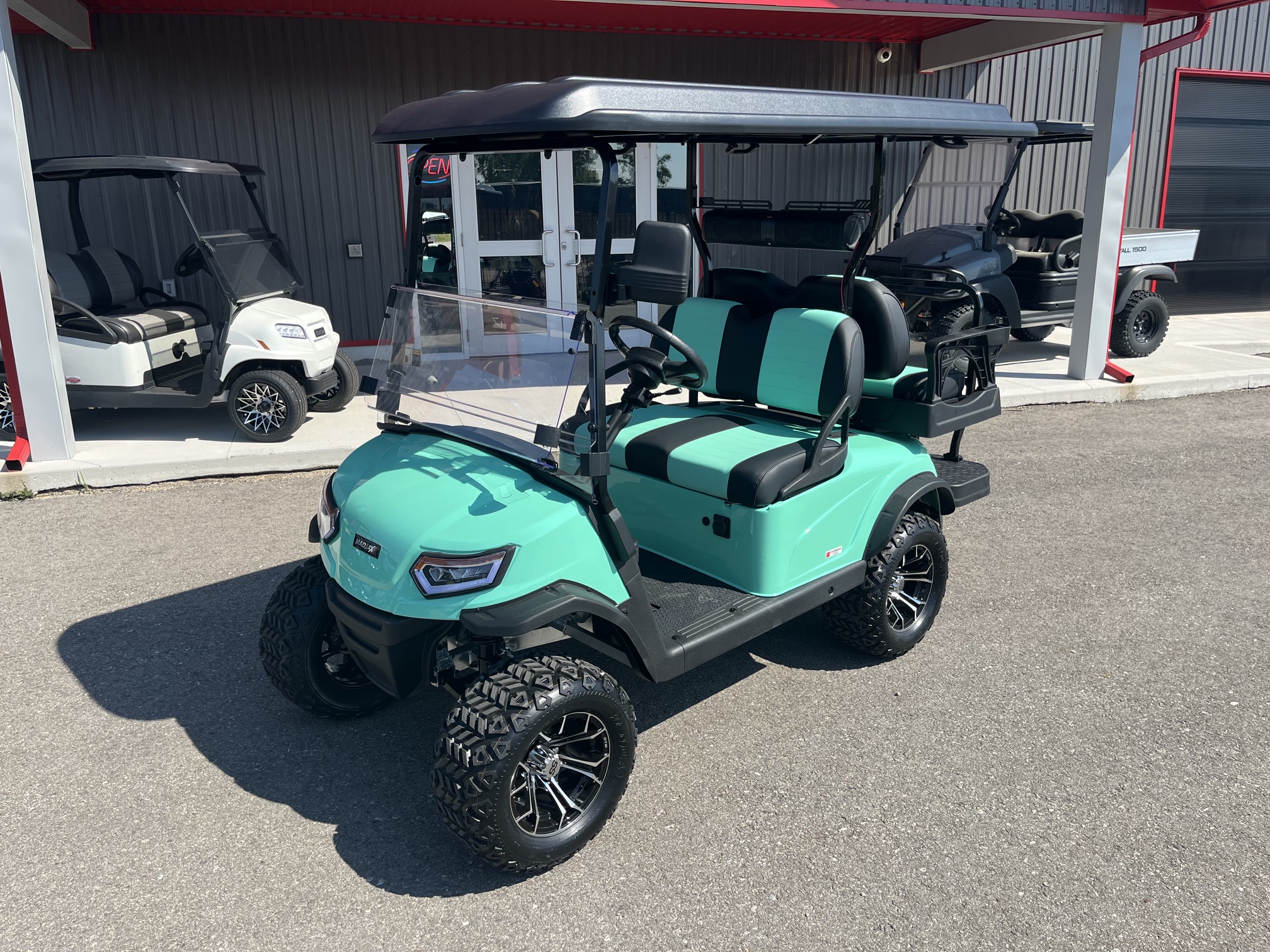 2026 Madjax E Series Lifted Caribbean Green Lithium 4 Passenger Golf Cart