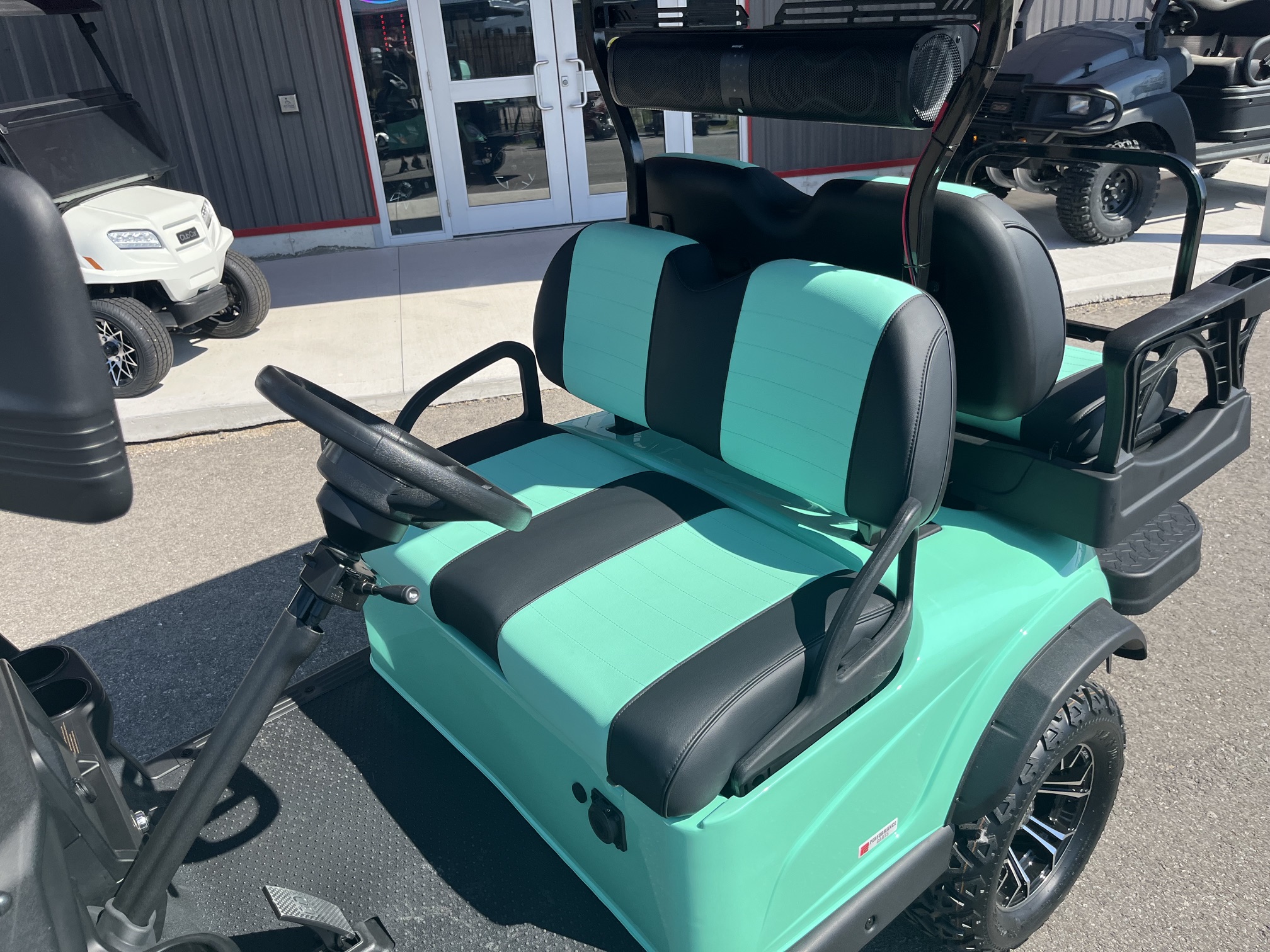 2026 Madjax E Series Lifted Caribbean Green Lithium 4 Passenger Golf Cart
