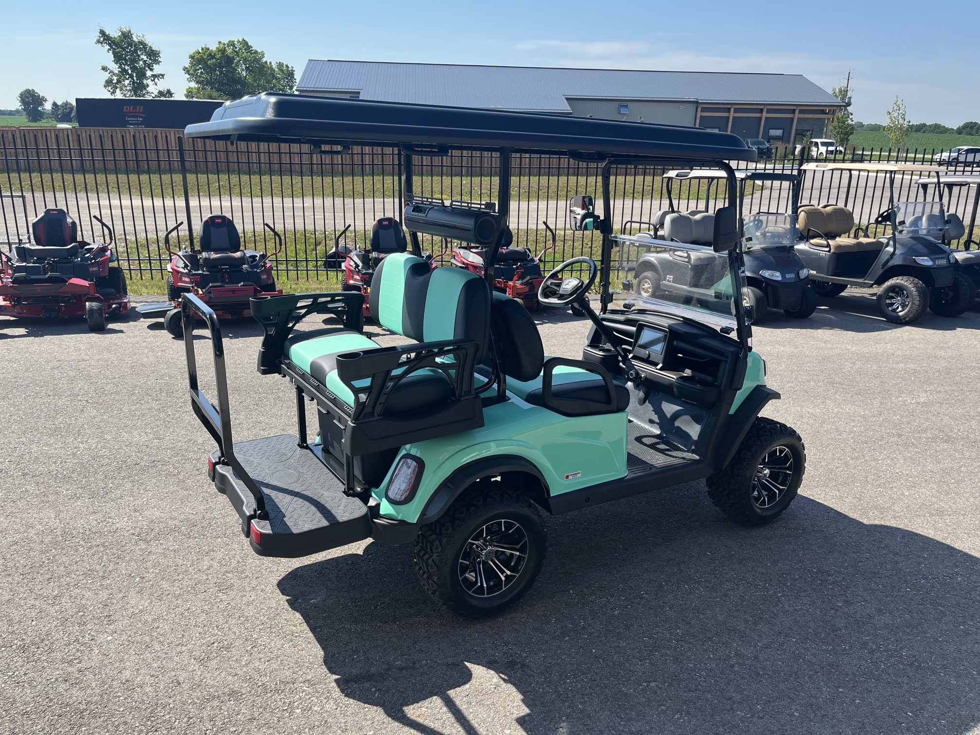 2026 Madjax E Series Lifted Caribbean Green Lithium 4 Passenger Golf Cart