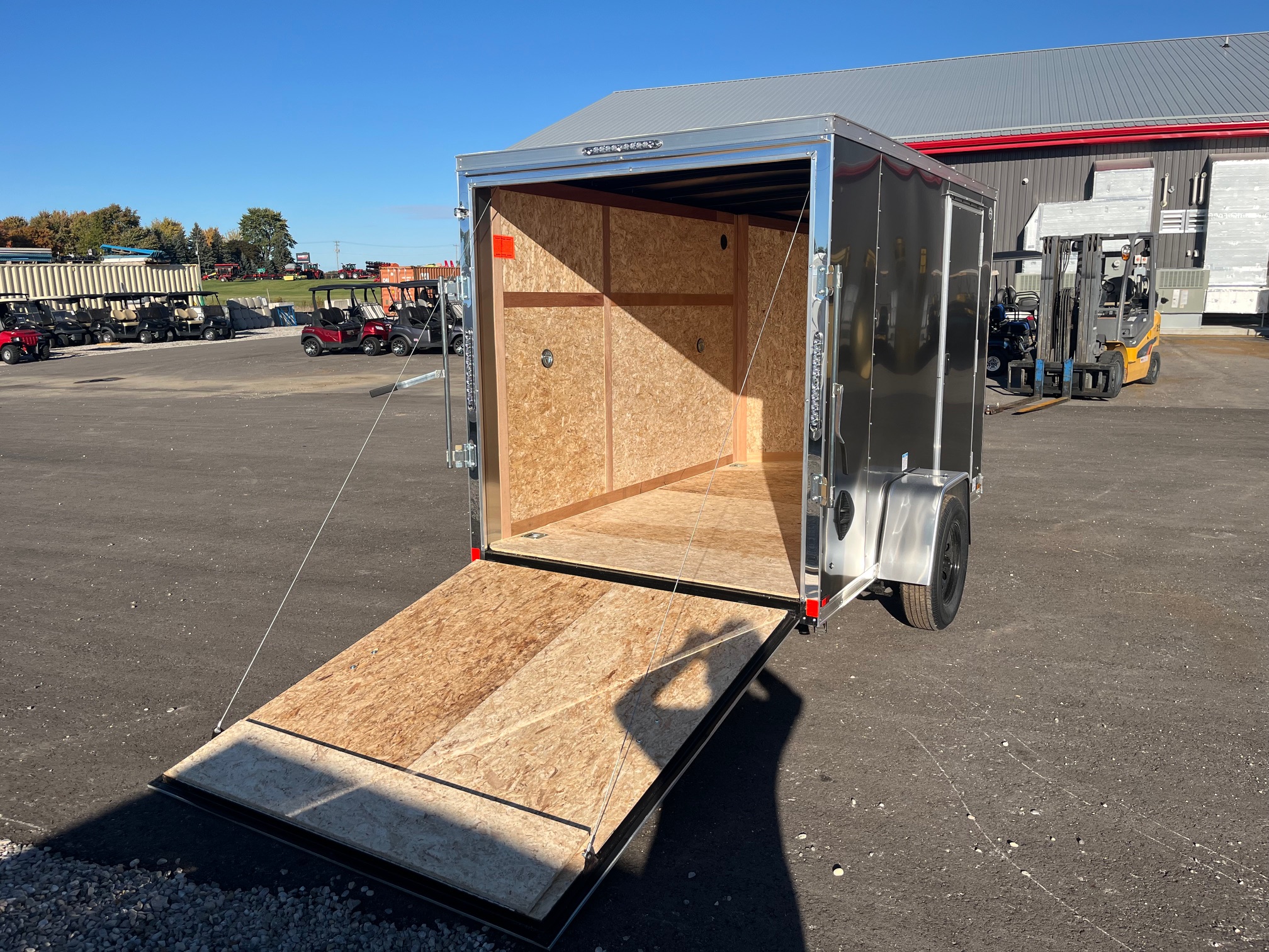 IMG_8410 2026 Hualin Enclosed Trailer with Ramp Door