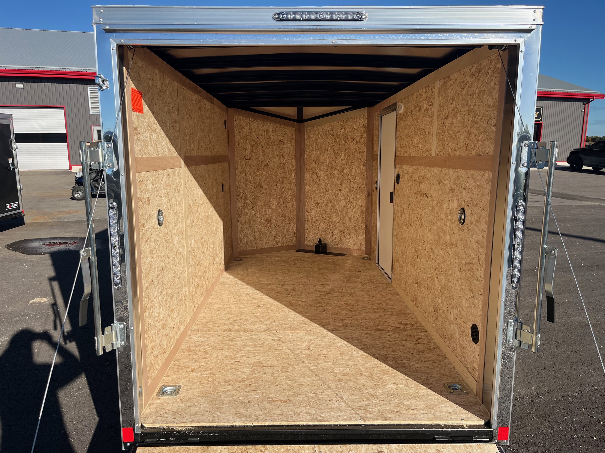 IMG_8419 2026 Haulin Enclosed Trailer Charcoal 6x12 Ramp Door